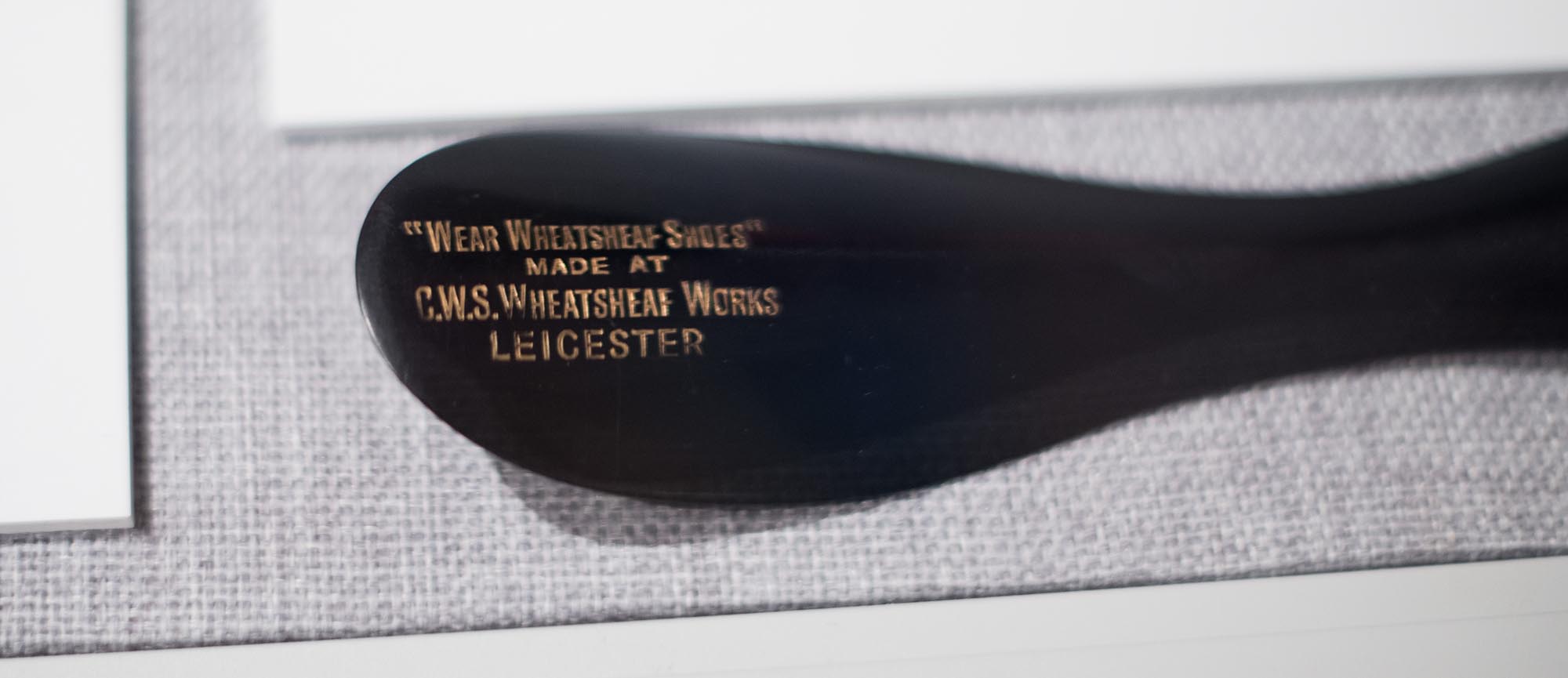 Shoehorn from Wheatsheaf Shoes, Leicester, early 1900s