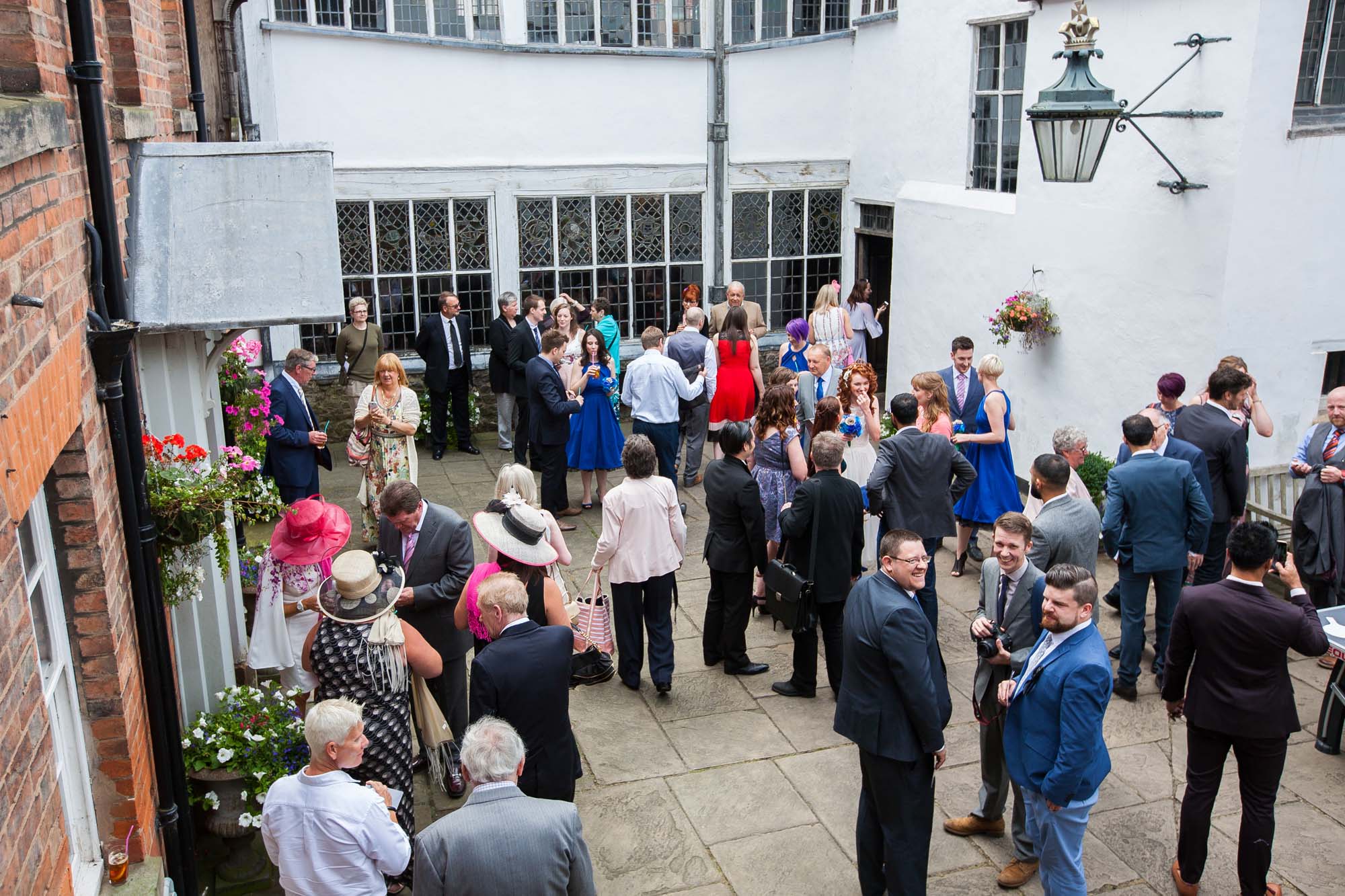 The enclosed courtyard offers a beautiful setting for group photos.